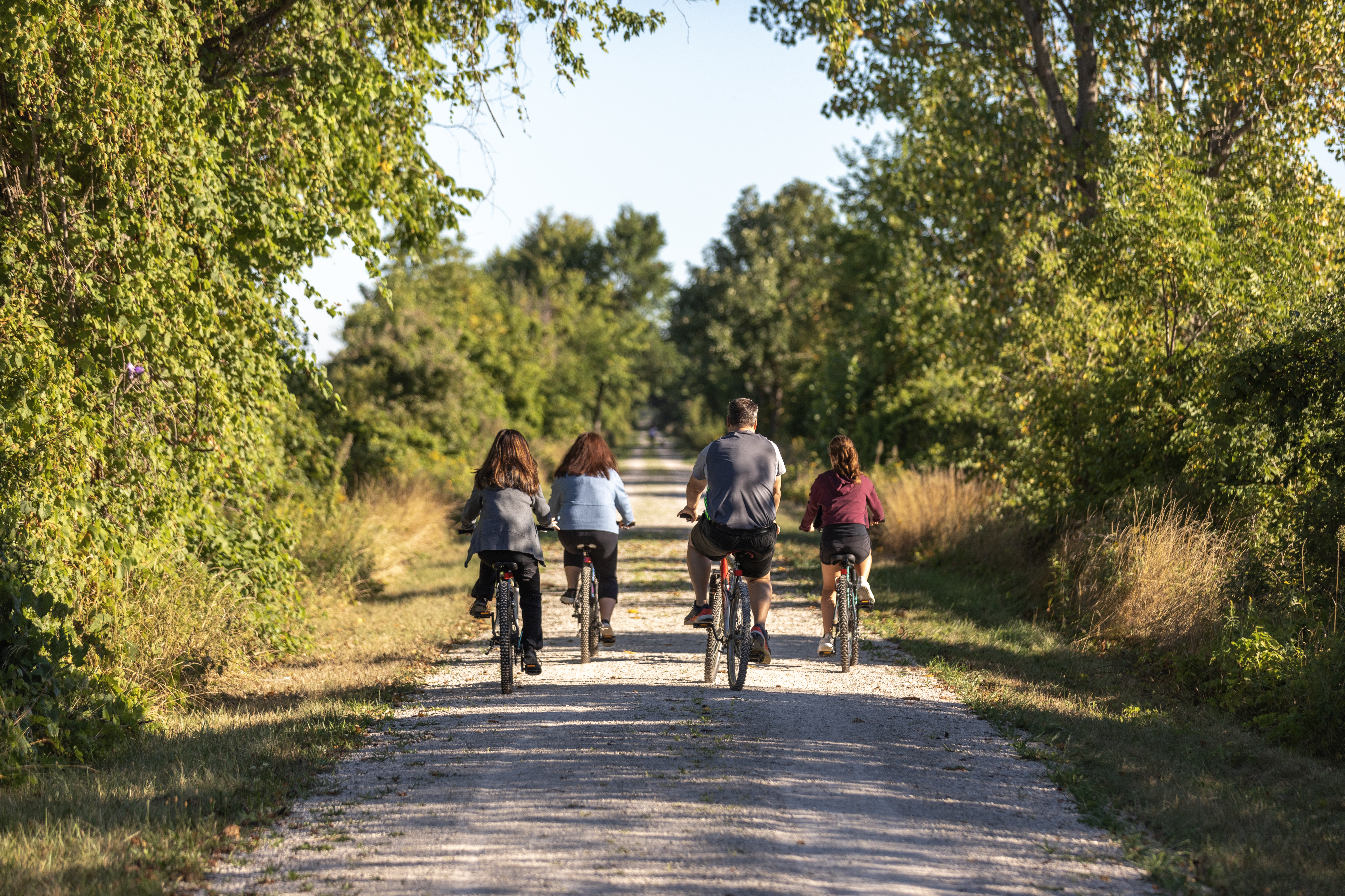 Family biking on greenway