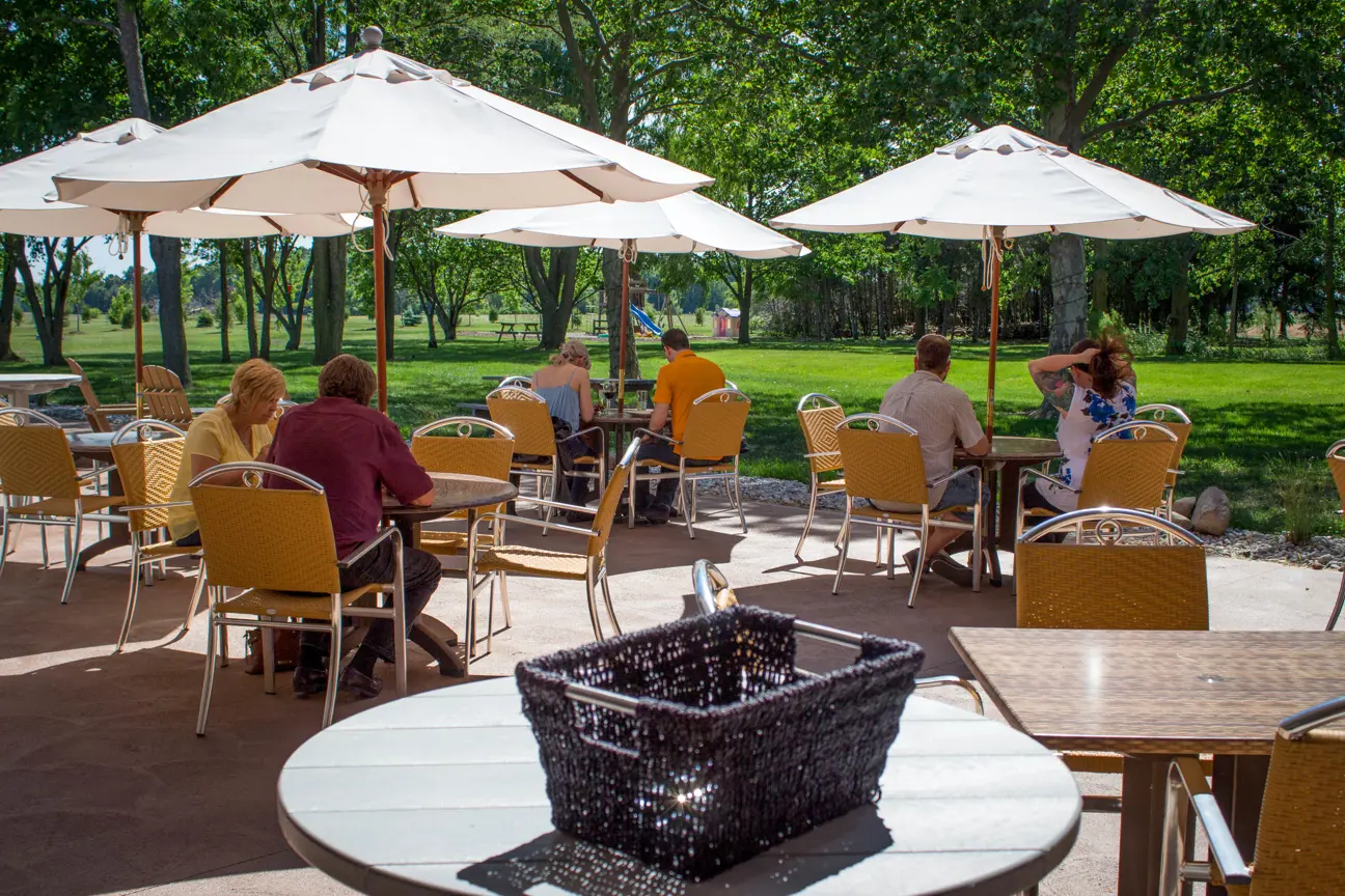 people sitting at outdoor patio